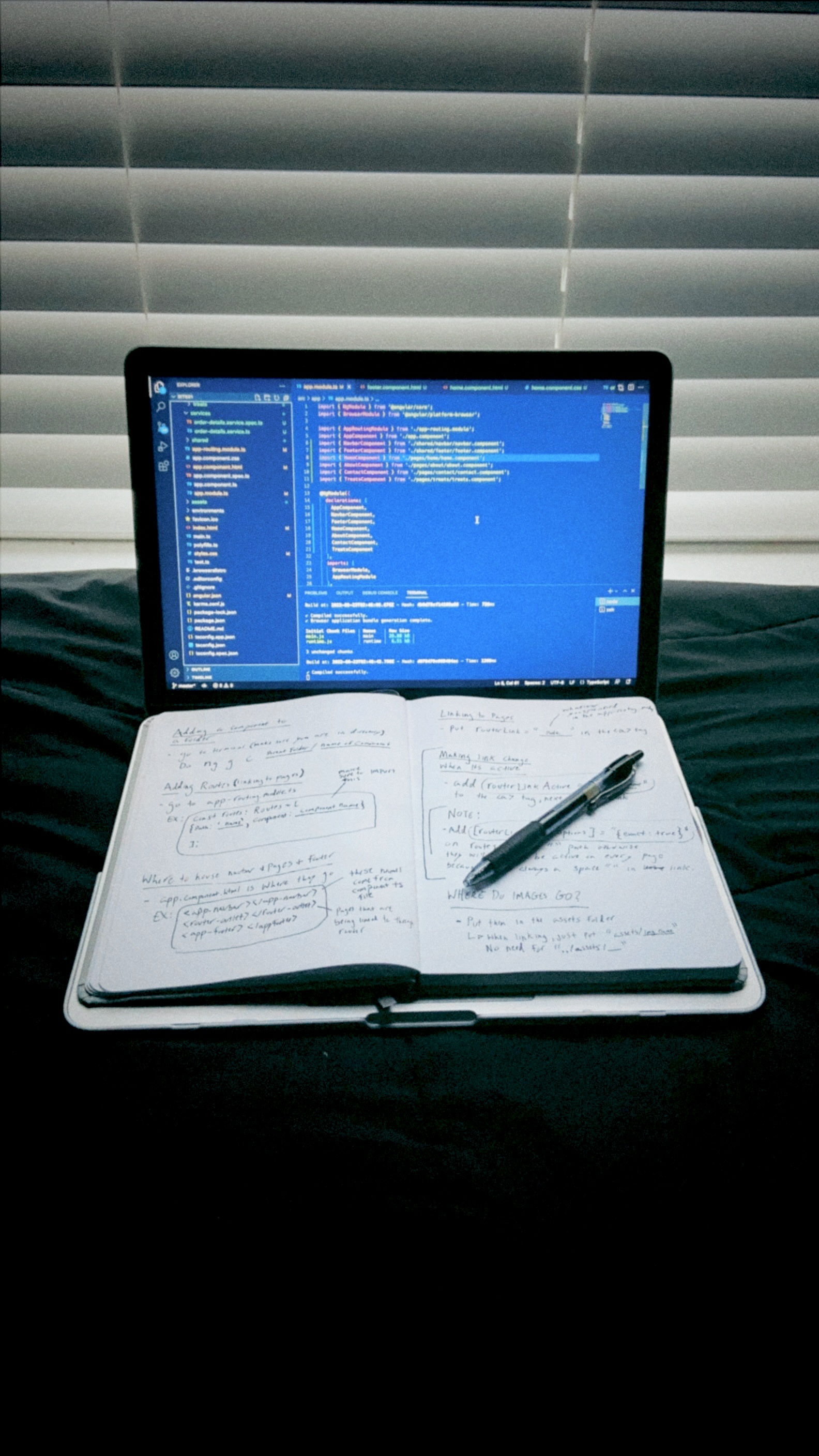 A laptop screen showing code.