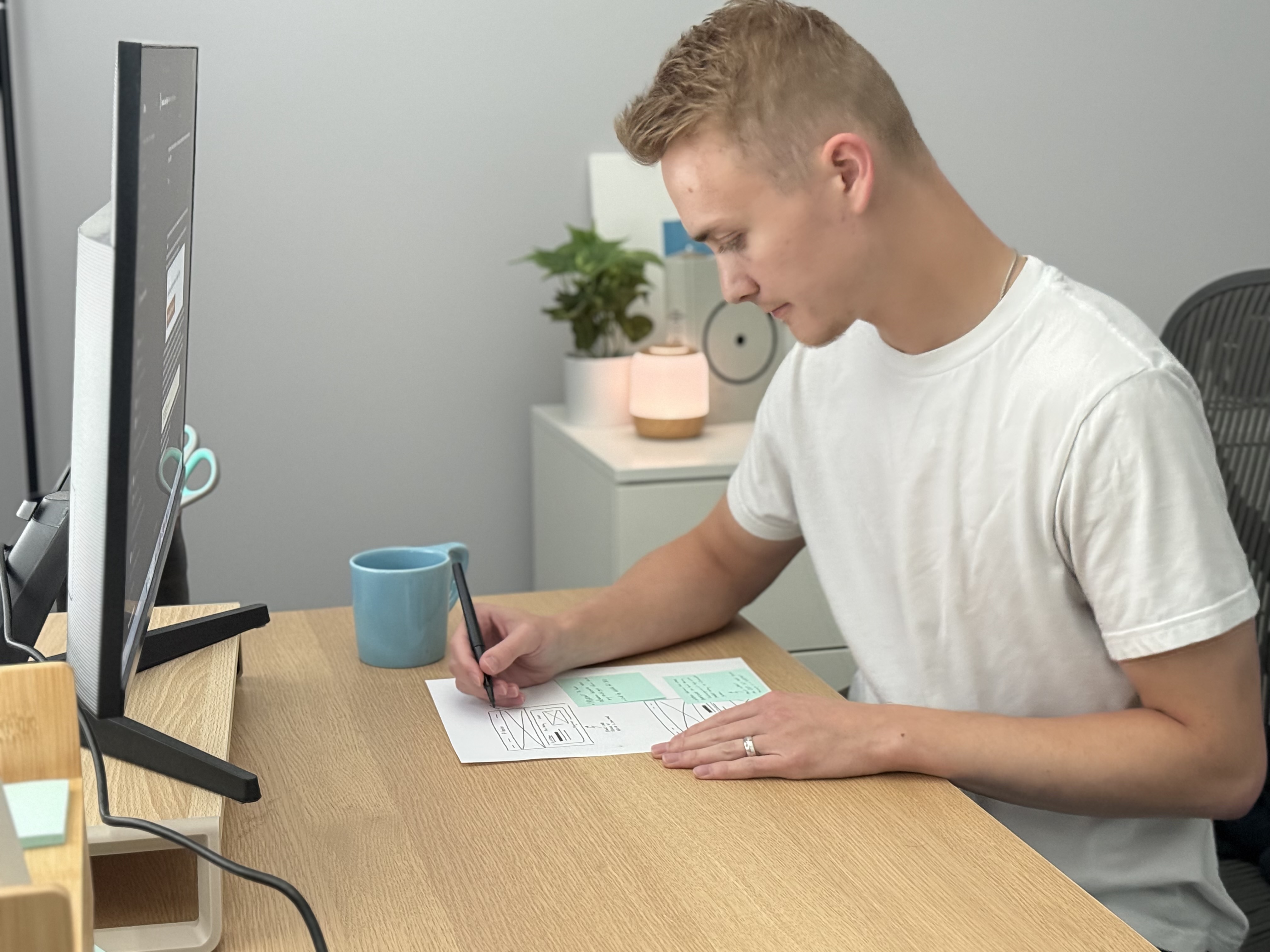 Jamie sketching design concepts by hand.